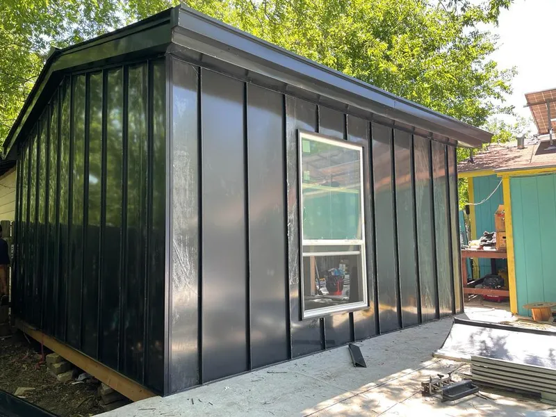 Black standing seam metal wall panels for Roof Inspection in Fairmount