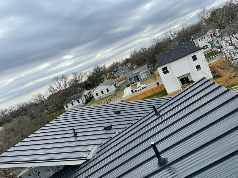 Standing seam metal roof panels with vents for Skylight Repair in Fairmount